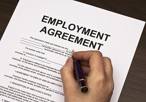 filling out employment agreement